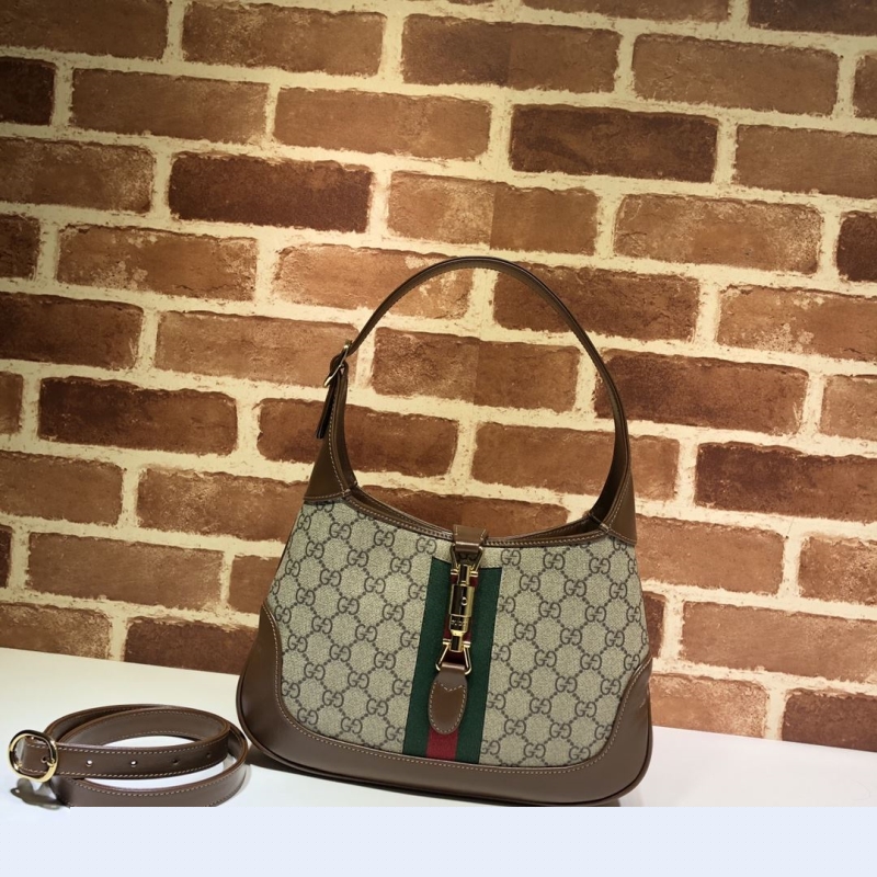G*u*i top handle bags